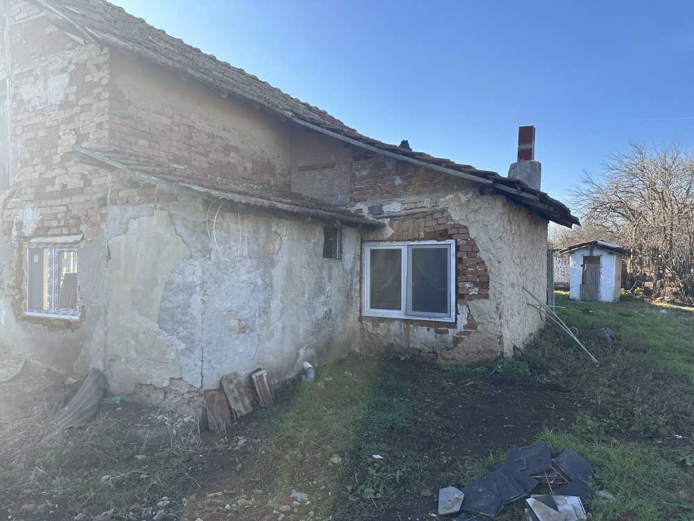 Foto 6 von 12 — Парцел с къща