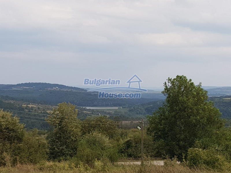 Foto 2 von 12 — Bulgarian property a house, a garage, garden 6000sq.m near lake