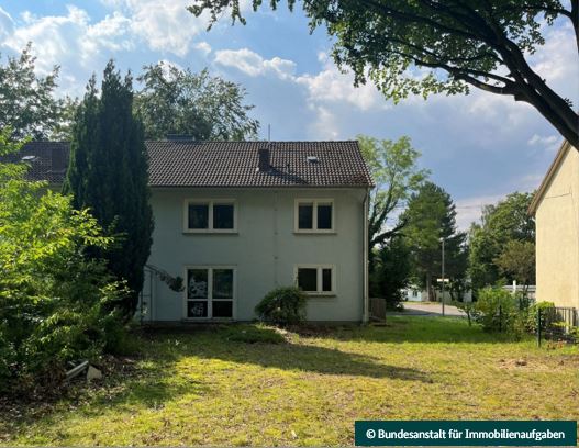 Foto 1 von 39 — 2 Doppelhaushälften in ruhiger Siedlung mit Gartenstadt-Flair