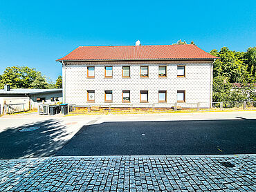 Foto 1 von 4 — Vermietetes, saniertes Mehrfamilienhaus
