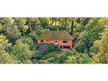 Foto 1 von 10 — Baugrundstück derzeit mit Backstein-Villa bebaut