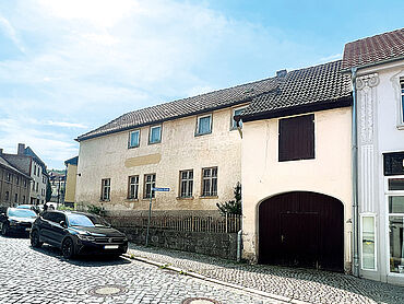 Foto 2 von 4 — Denkmalgeschütztes Mehrfamilienhaus