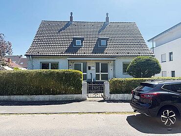 Foto 1 von 5 — Baugrundstück in Rheinnähe mit positivem Bauvorbescheid für ein Mehrfamilienhaus und Altbestand