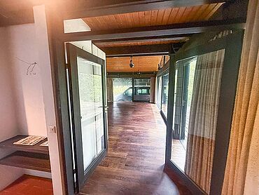 Foto 5 von 6 — Einfamilienhaus in Split-Level-Architektur und Einliegerwohnung