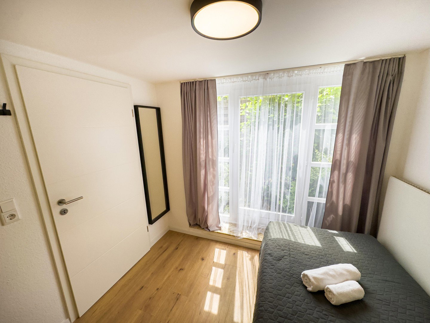 Foto 10 von 12 — Modernisiertes Endreihenhaus mit 2 Bädern und 2 Loggien – ideal für Eigennutzer oder Kapitalanleger