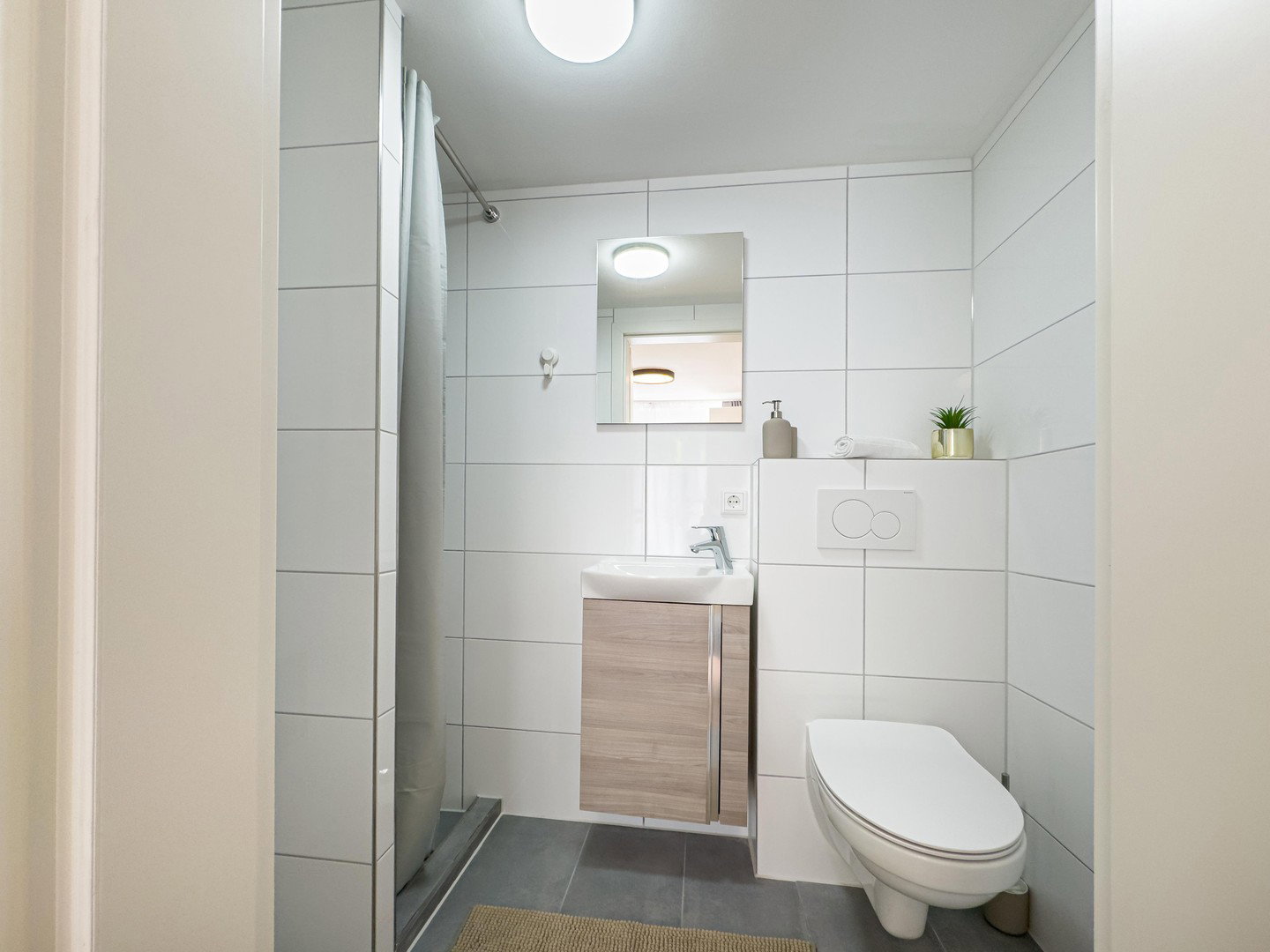 Foto 6 von 12 — Modernisiertes Endreihenhaus mit 2 Bädern und 2 Loggien – ideal für Eigennutzer oder Kapitalanleger