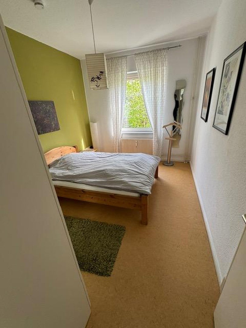 Foto 11 von 12 — Kleines MFH mit drei Wohnungen und Garten - Bremen-Osterfeuerberg