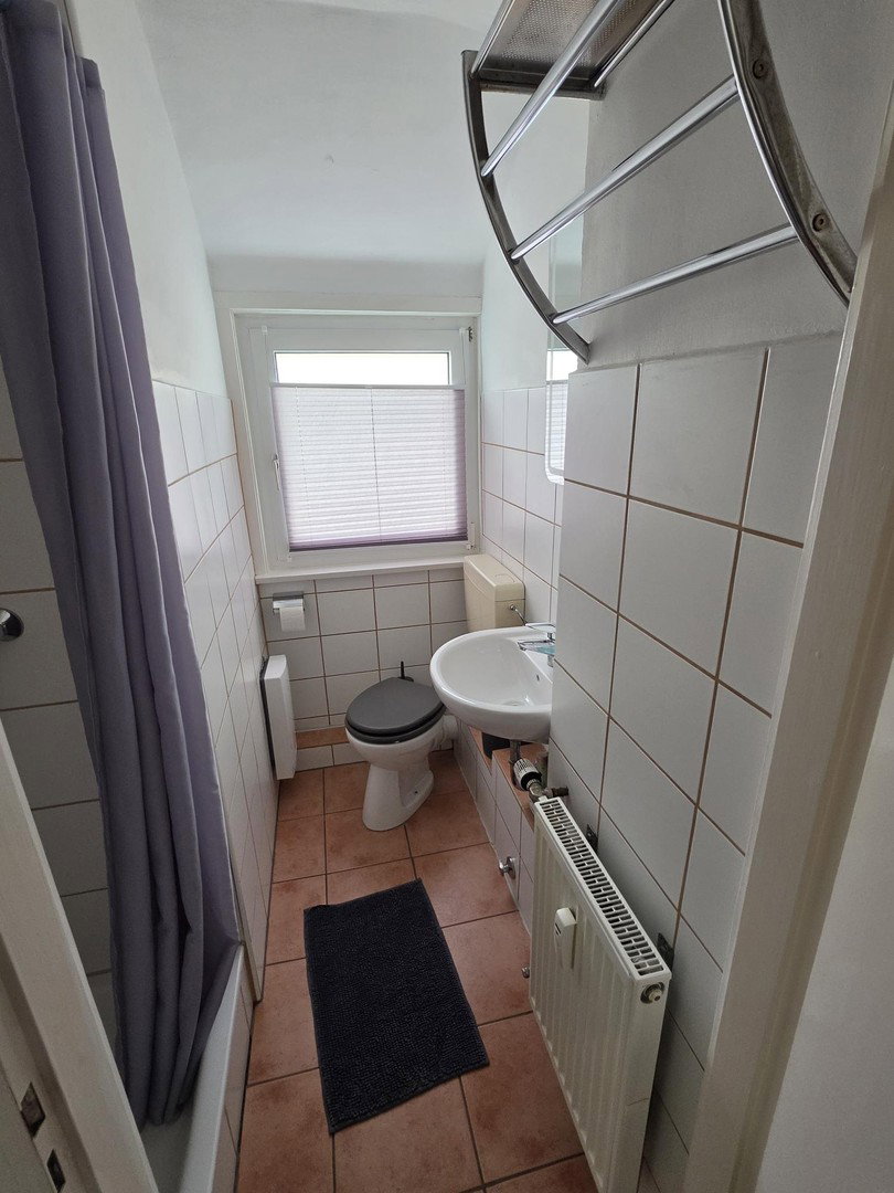 Foto 7 von 11 — Attraktives Mehrfamilienhaus in Bremen Neustadt; zentrale Lage