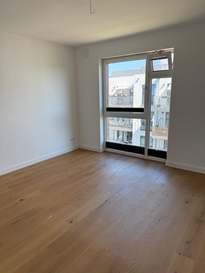 Foto 11 von 12 — Barrierefreie 4-Zimmer-Endetagenwohnung mit Balkon und Tiefgarage mit Wallbox