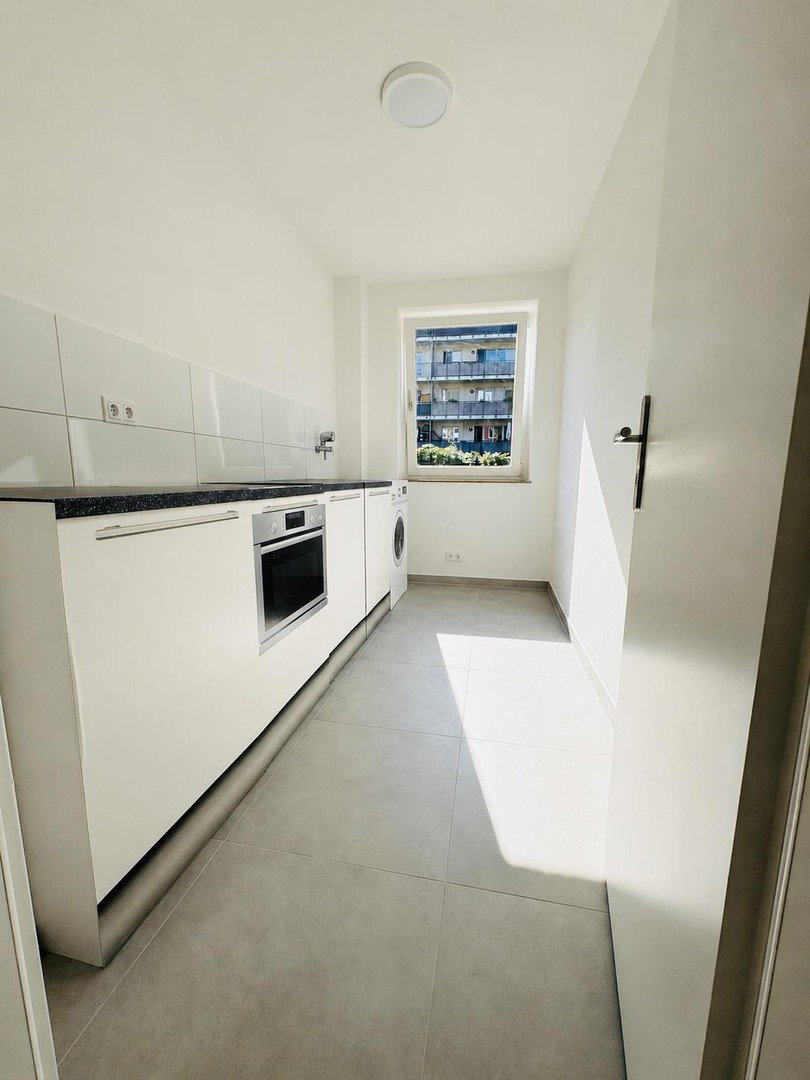 Foto 4 von 12 — Wohnen wie im eigenen Haus – renovierte 3 -Zimmer Wohnung mit großer Terrasse & Garten