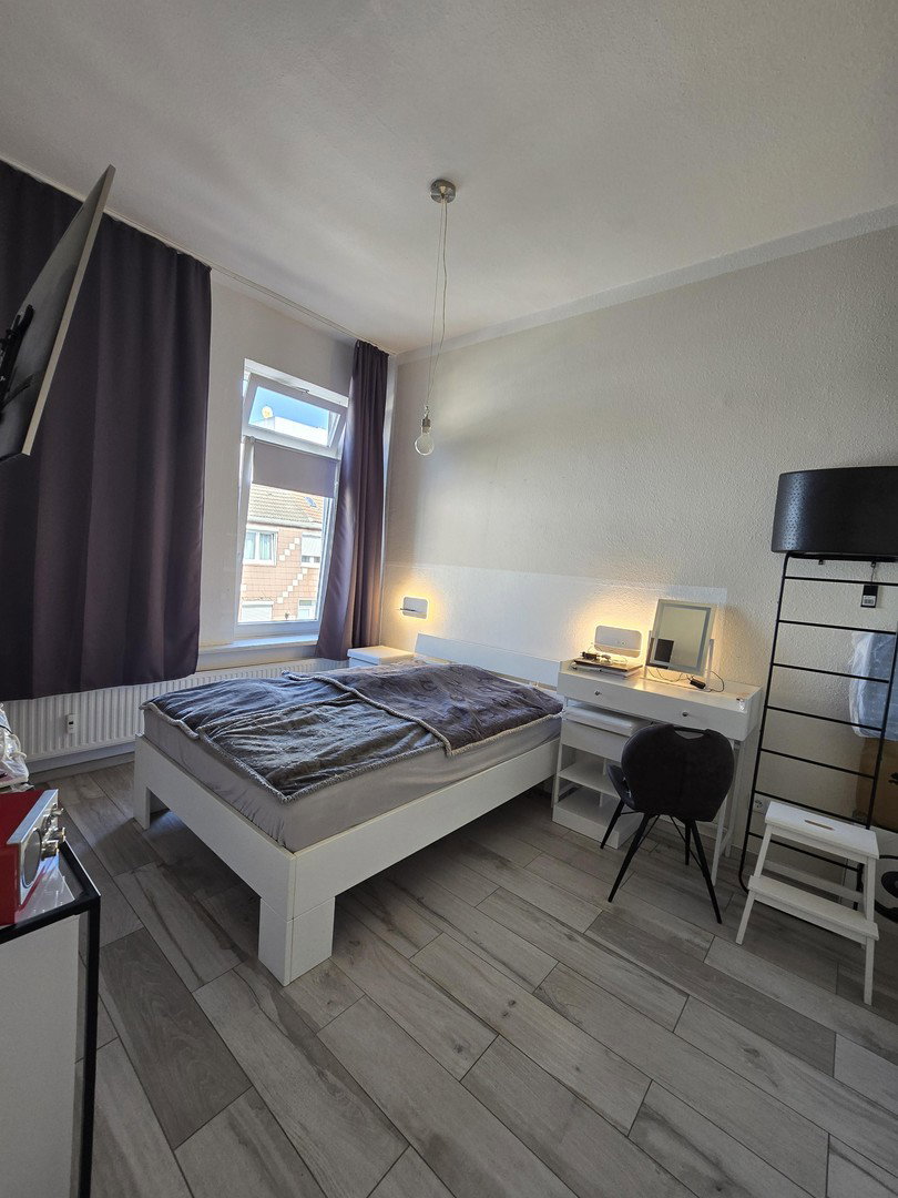 Foto 8 von 12 — Charmante 2,5-Zimmer-Wohnung mit großzügiger Südterrasse