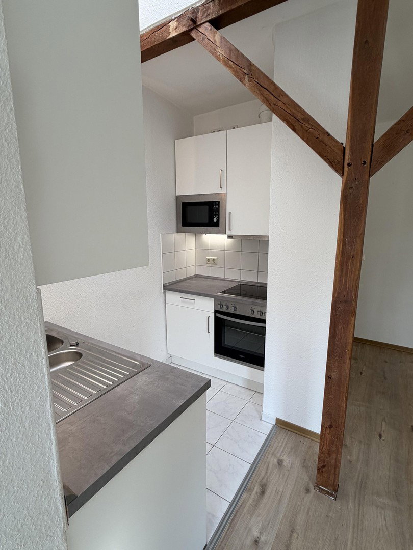 Foto 5 von 10 — 1-Zimmer - Dachgeschosswohnung in zentraler Lage zum Verkauf von Privat