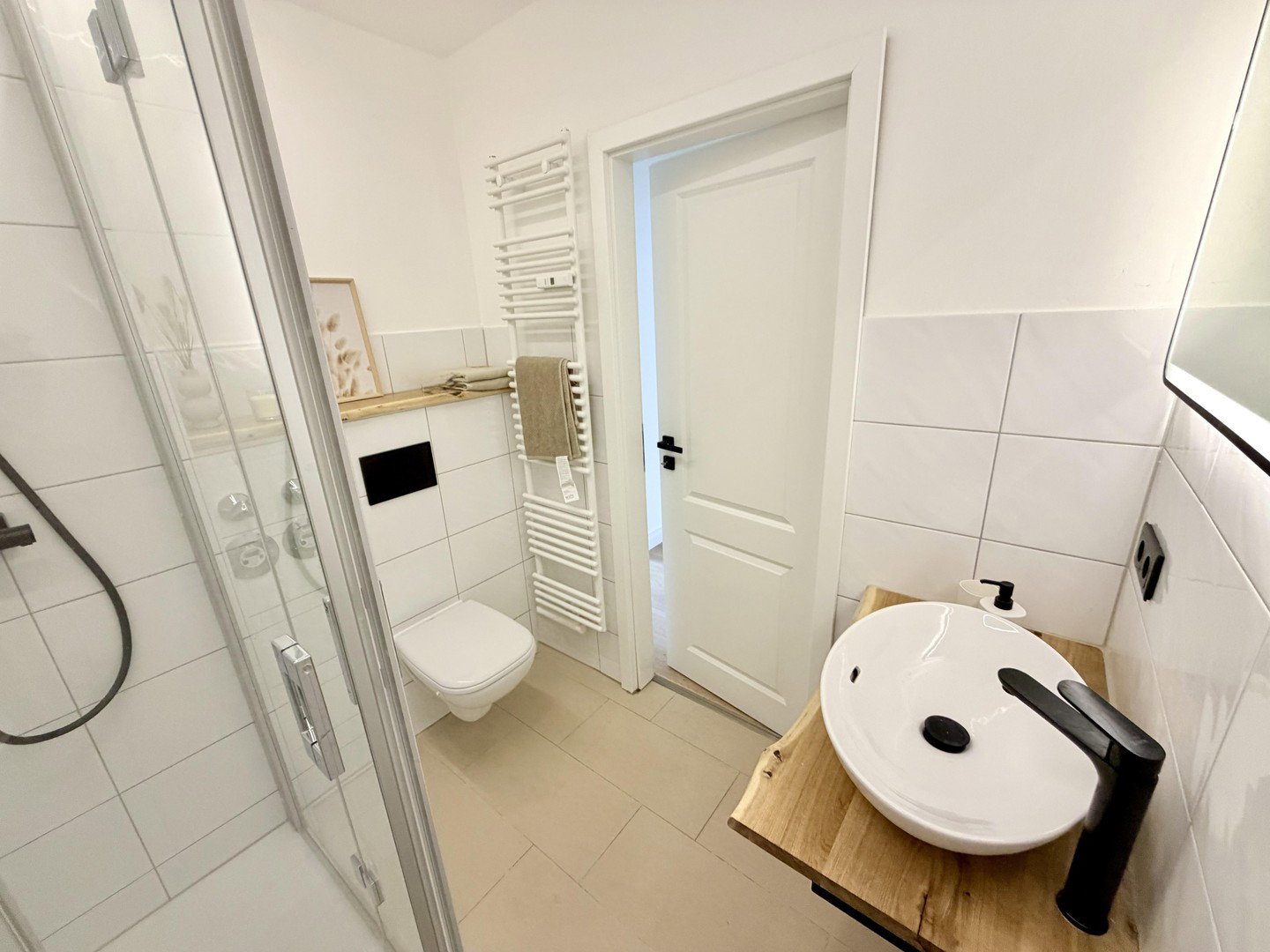 Foto 8 von 12 — Frisch renovierte und freie 3-Zimmerwohnung mit Südbalkon