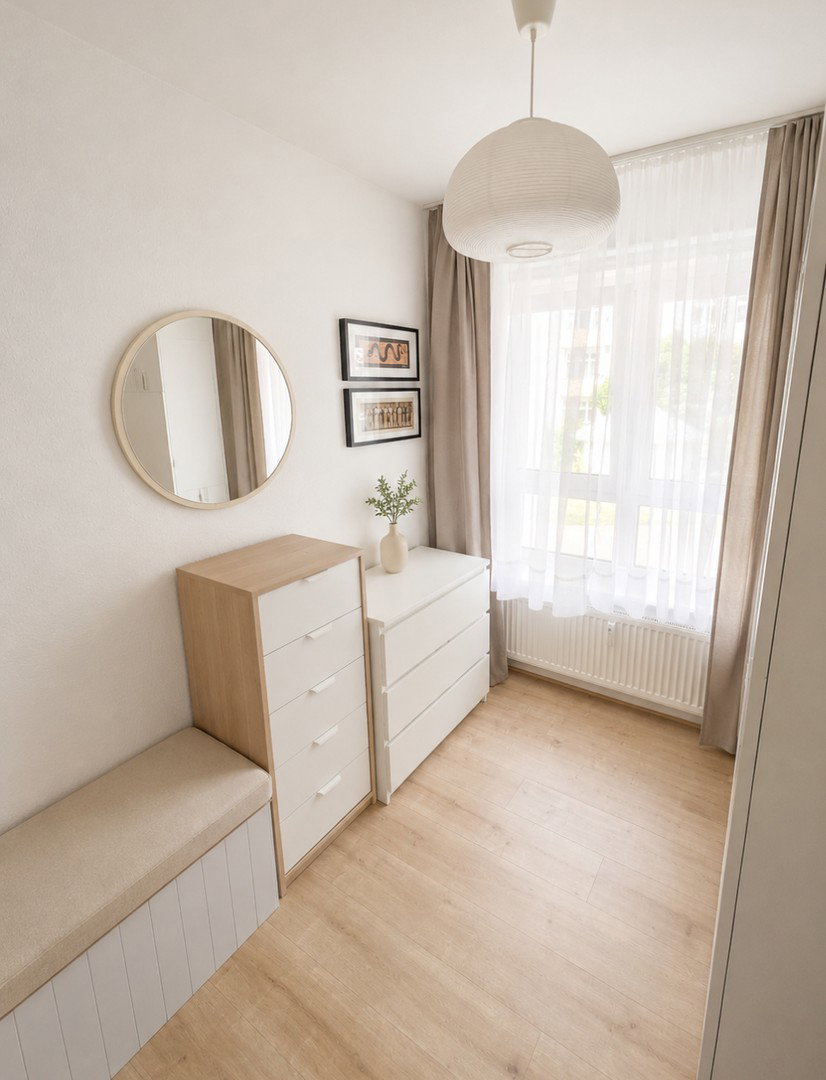 Foto 7 von 12 — Gepflegte 2-Zimmer-Wohnung mit Südwest-Terrasse, separatem Aufgang und Tiefgaragenstellplatz