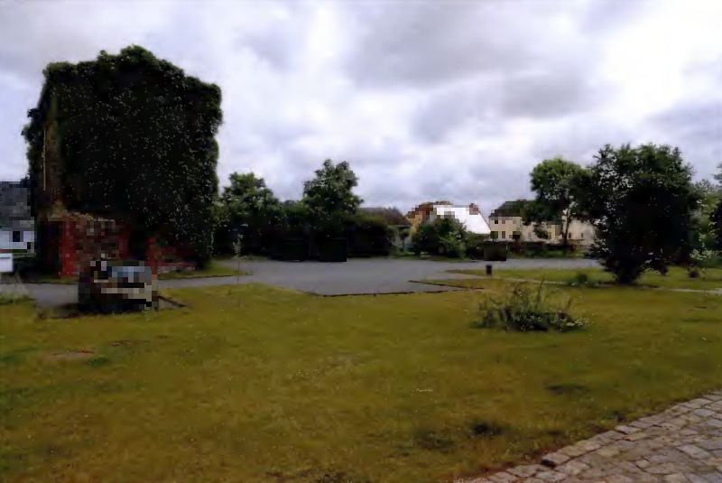 Foto 1 von 3 — Zwei unbebaute, als Parkplatz und Wiese genutzte Grundstücke in Krugsdorf