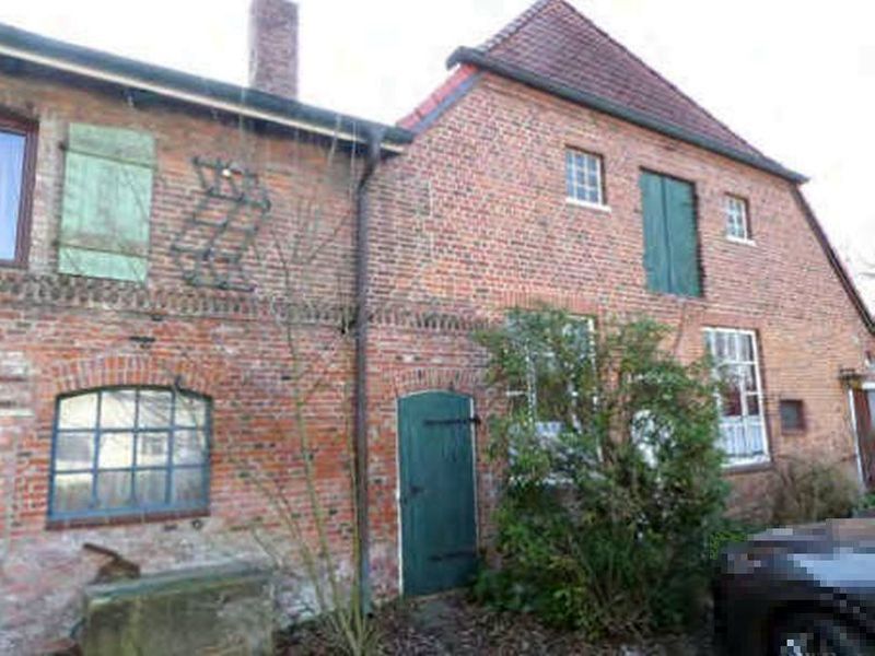 Foto 1 – Wohnhaus, Werkstattgebäude, 2 Garagen und Zuwegung in Quickborn