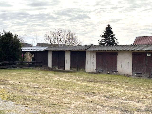 Foto 35 von 39 — Einfamilienhaus (Doppelhaushälfte) mit 2 Garagen in Siedenbollentin