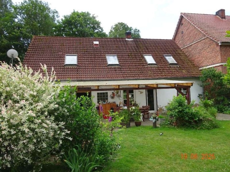 Foto 1 von 16 — Einfamilienhaus, Garage und Nebengebäude mit Werkstatt in Heidhof