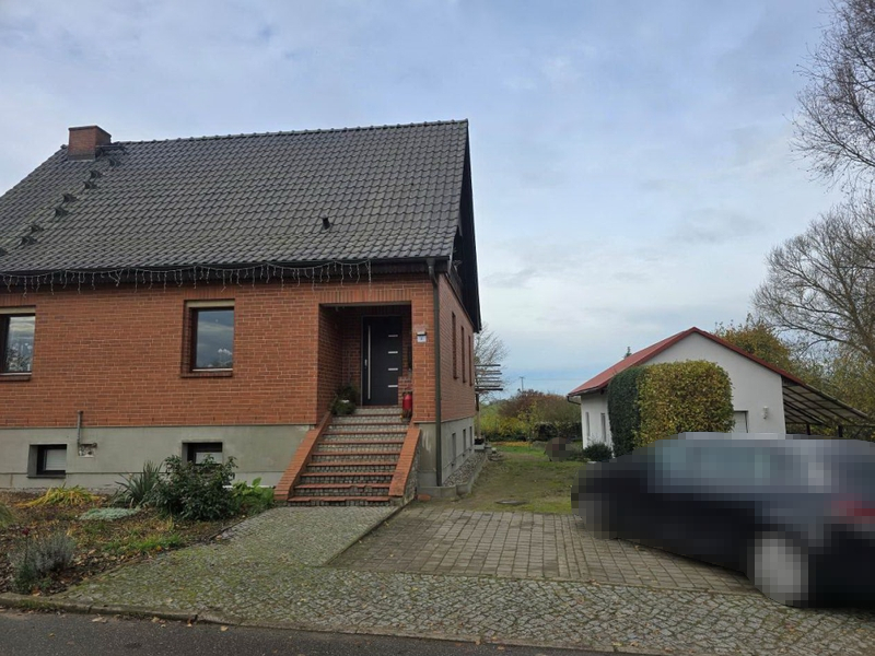 Foto 1 von 4 — Einfamilienhaus mit massiver Garage in Lalendorf OT Vogelsang