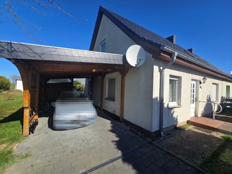 Foto 1 von 36 — Einfamilienwohnhaus (Doppelhaushälfte) mit Nebengebäuden in Groß Teetzleben