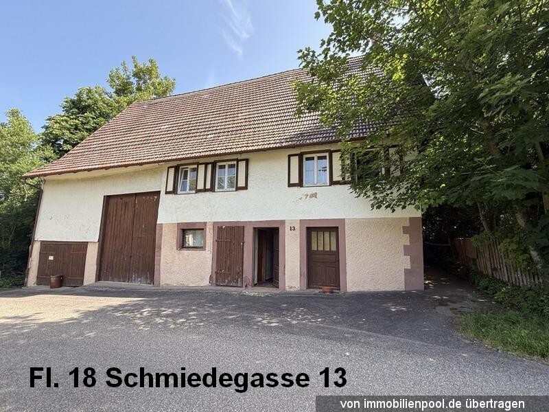 Foto 3 von 4 — Einfamilienhaus, Wohn-und Ökonomiegebäude, Gartenland und Ackerland