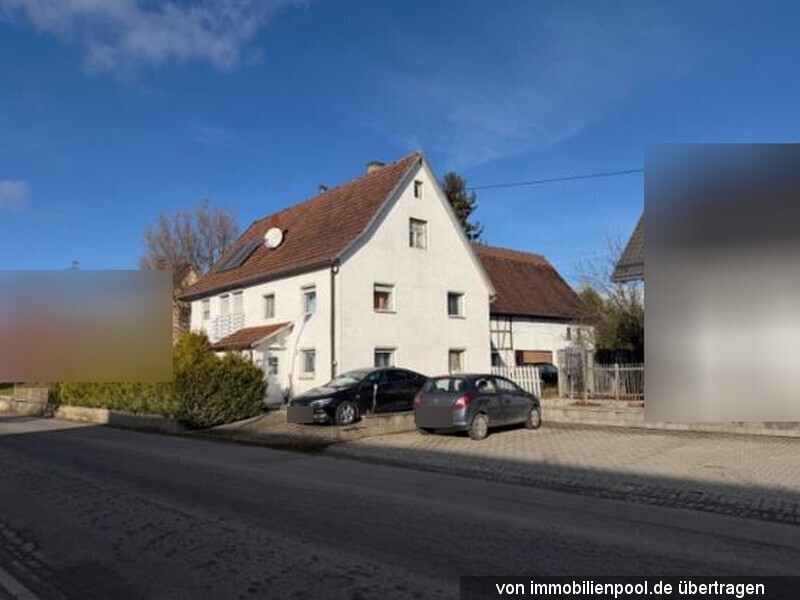 Foto 2 von 2 — 1/2 Anteil an Wohnhaus mit Nebengebäude