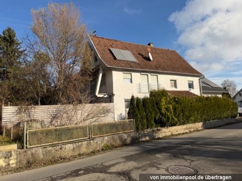 Foto 1 von 2 — 1/2 Anteil an Wohnhaus mit Nebengebäude