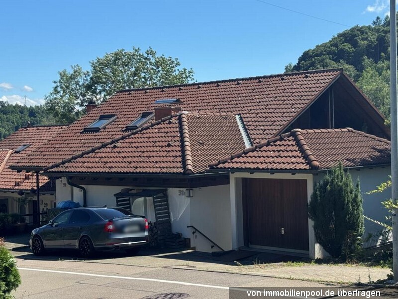 Foto 2 von 3 — 4-Zimmerwohnung mit Garage