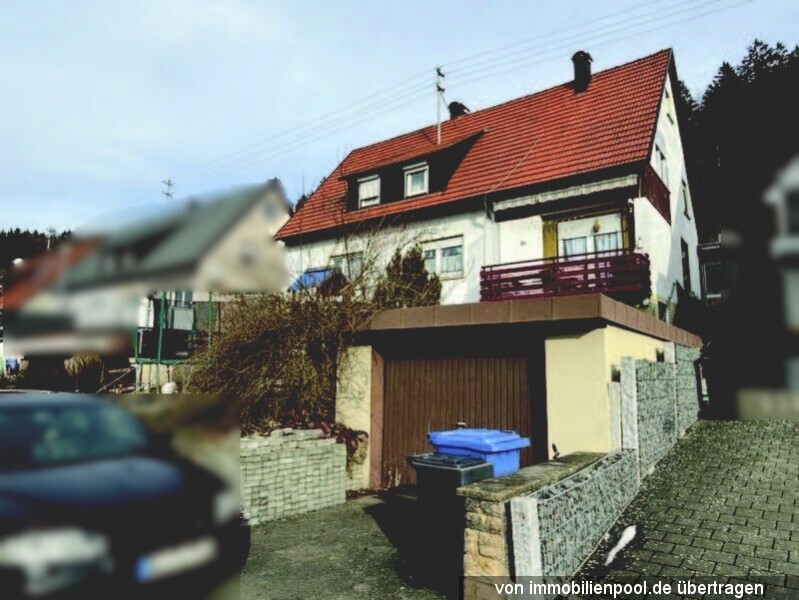 Foto 2 von 3 — 2 Doppelhaushälften mit jeweils einer Garage