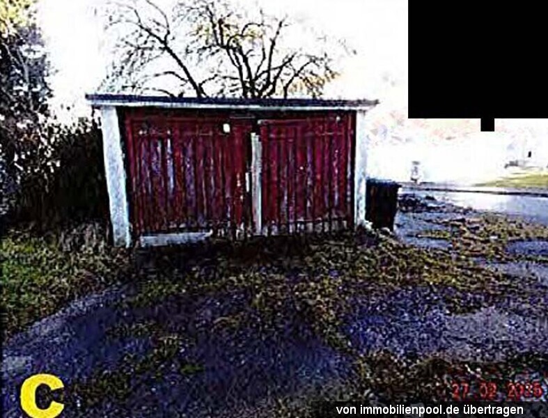 Foto 3 von 3 — Mehrfamilienhaus mit Garage