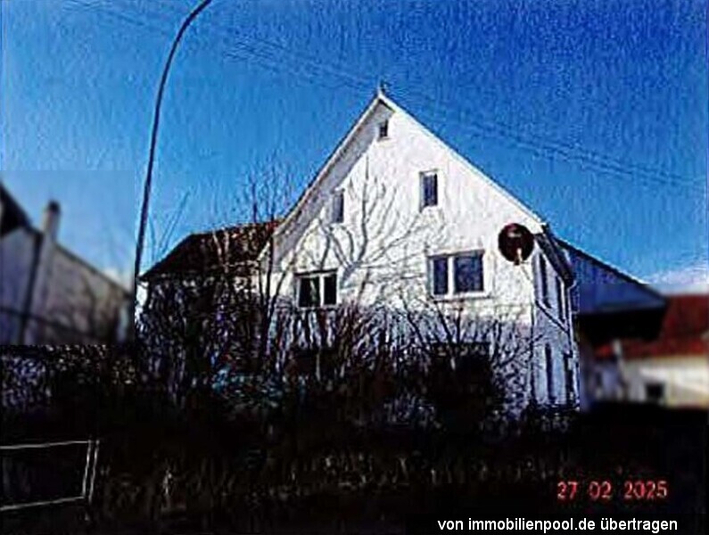 Foto 2 von 3 — Mehrfamilienhaus mit Garage