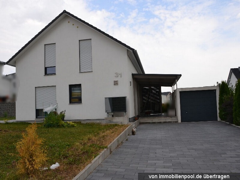 Foto 1 von 3 — Einfamilienhaus mit Einzelgarage