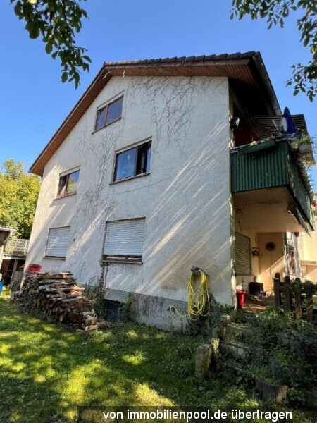 Foto 3 von 4 — 4-Zimmerwohnung mit Garagenstellplatz und Hobbyraum