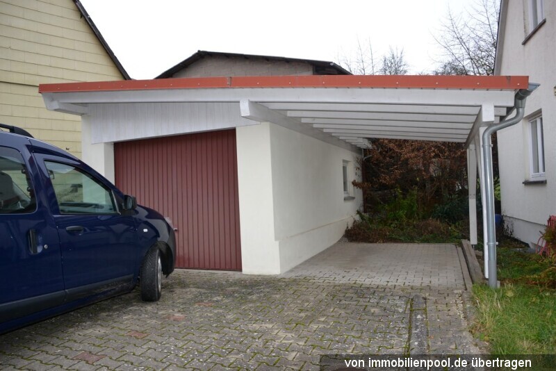 Foto 4 von 5 — Einfamilienhaus und Einzelgarage