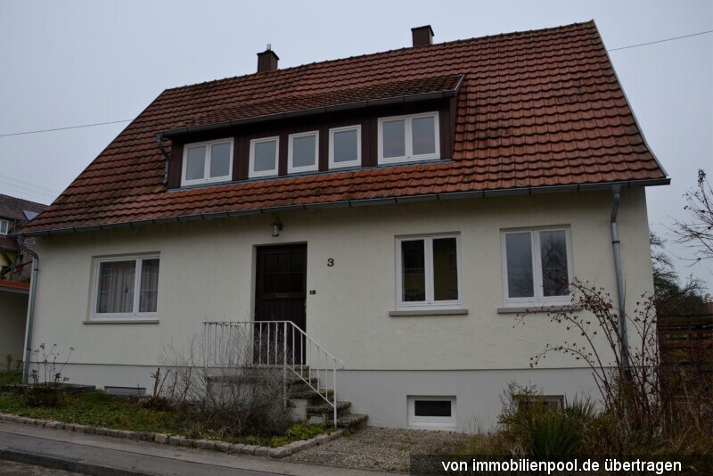 Foto 3 von 5 — Einfamilienhaus und Einzelgarage