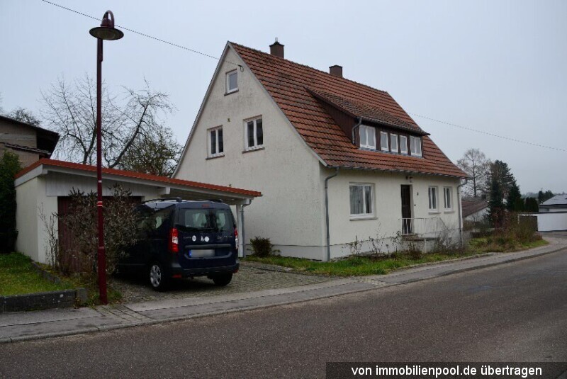 Foto 1 von 5 — Einfamilienhaus und Einzelgarage