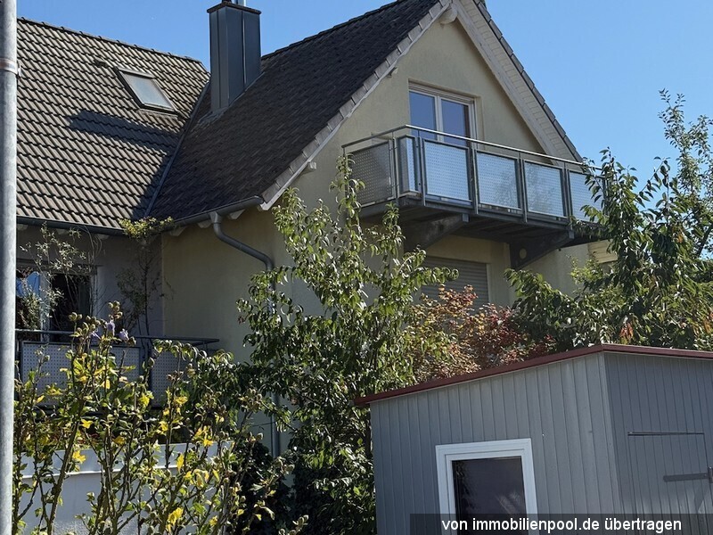 Foto 1 von 2 — Doppelhaushälfte mit Garage