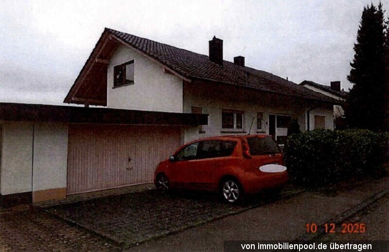 Foto 3 von 5 — Einfamilienhaus mit Einliegerwohnung und Garage