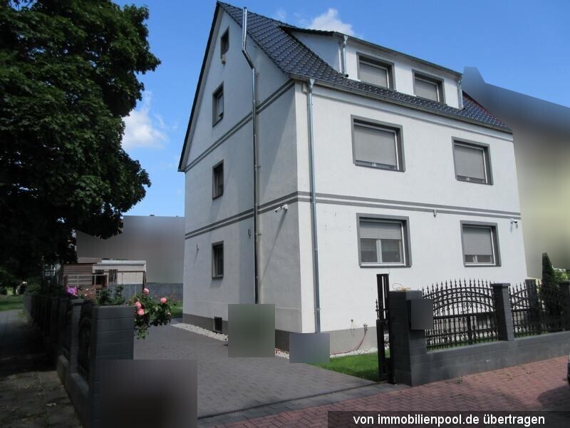 Foto 2 von 2 — Doppelhaushälfte mit Anbau