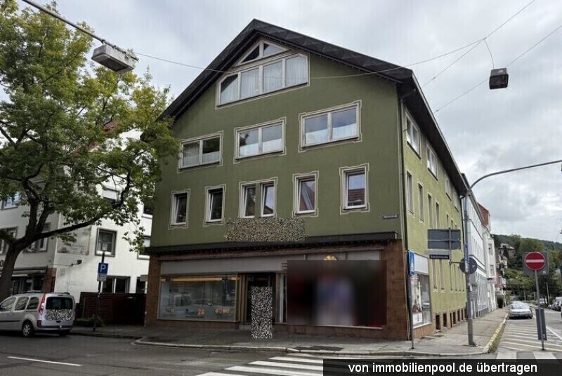 Foto 3 von 3 — Wohn- und Geschäftshaus