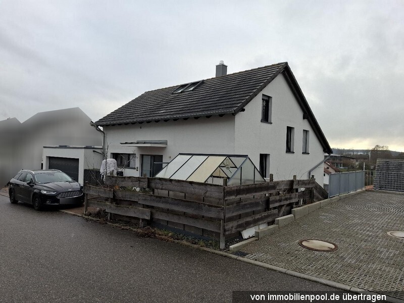 Foto 2 von 3 — Einfamilienhaus mit Doppelgarage