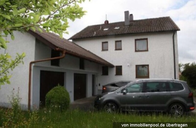 Foto 2 von 4 — Zweifamilienhaus mit Doppelgarage und Freisitz