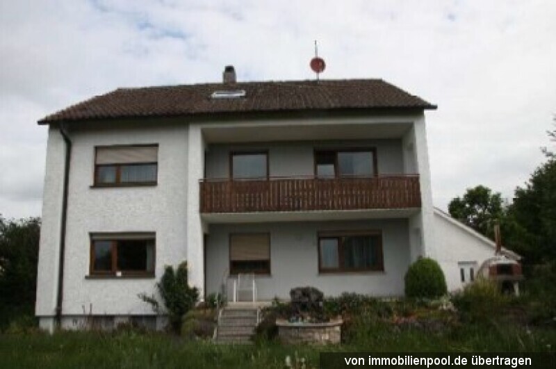 Foto 1 von 4 — Zweifamilienhaus mit Doppelgarage und Freisitz