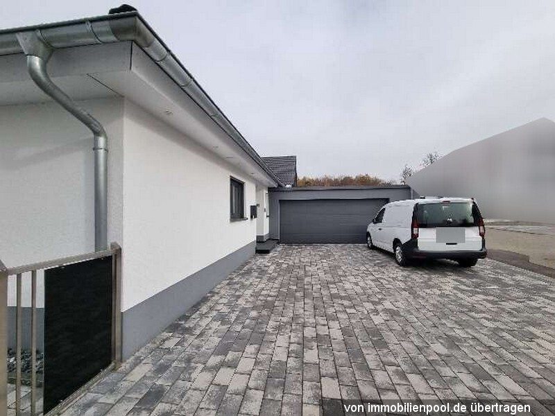 Foto 2 von 3 — Einfamilienhaus mit Doppelgarage