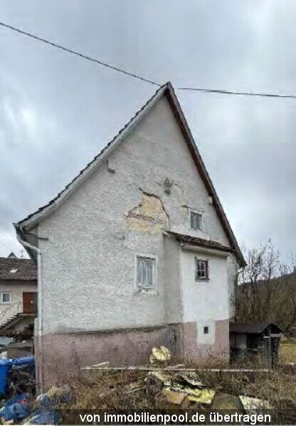 Foto 3 von 3 — Einfamilienhaus mit Garten