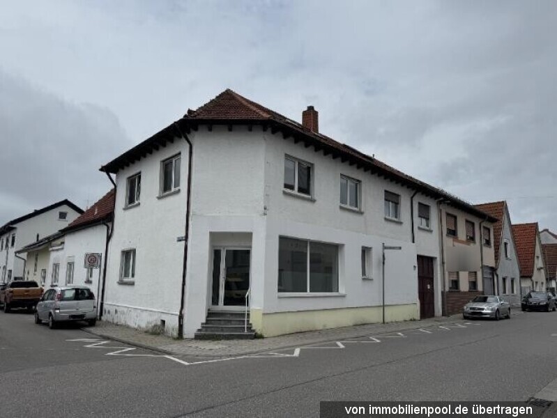 Foto 1 von 4 — Wohn- und Geschäftshaus