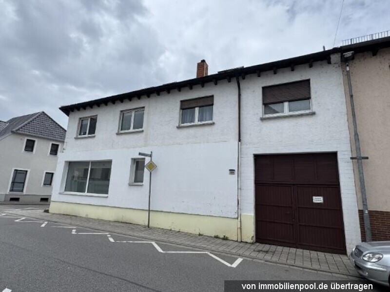 Foto 2 von 4 — Wohn- und Geschäftshaus