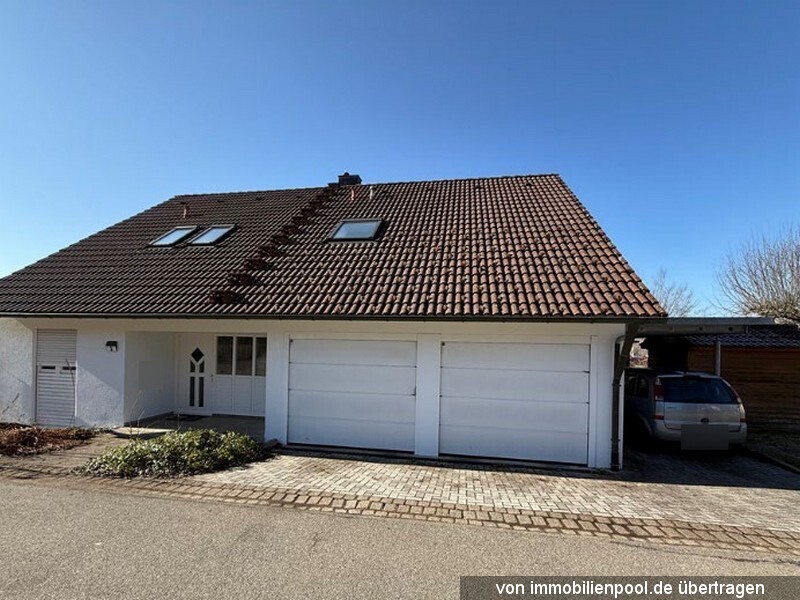 Foto 1 von 2 — Einfamilienhaus mit Doppelgarage und Carport