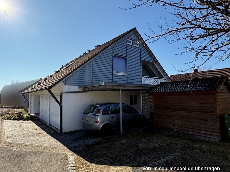 Foto 2 von 2 — Einfamilienhaus mit Doppelgarage und Carport