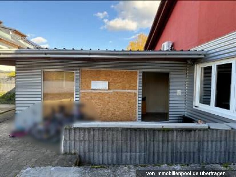 Foto 4 von 5 — Gewerbegebäude mit Büro- und Lagerräumen